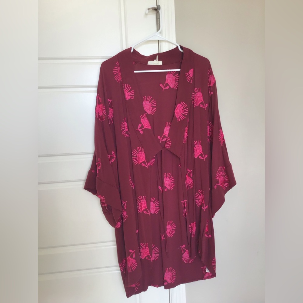 Embroidered pink kimono.